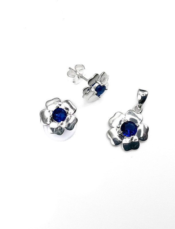 Juegos plata flor lisa piedra azul a presion