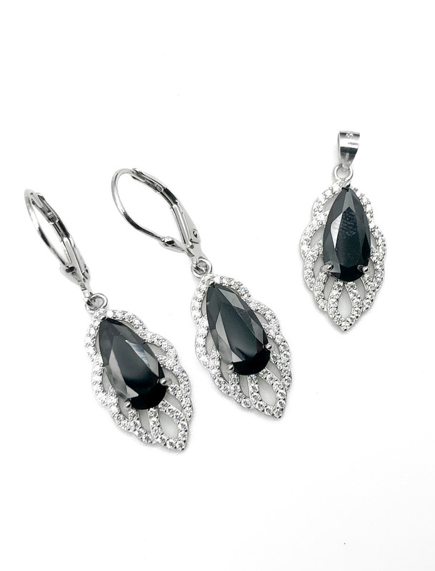 Juegos plata gota espejo piedra negra central con aza