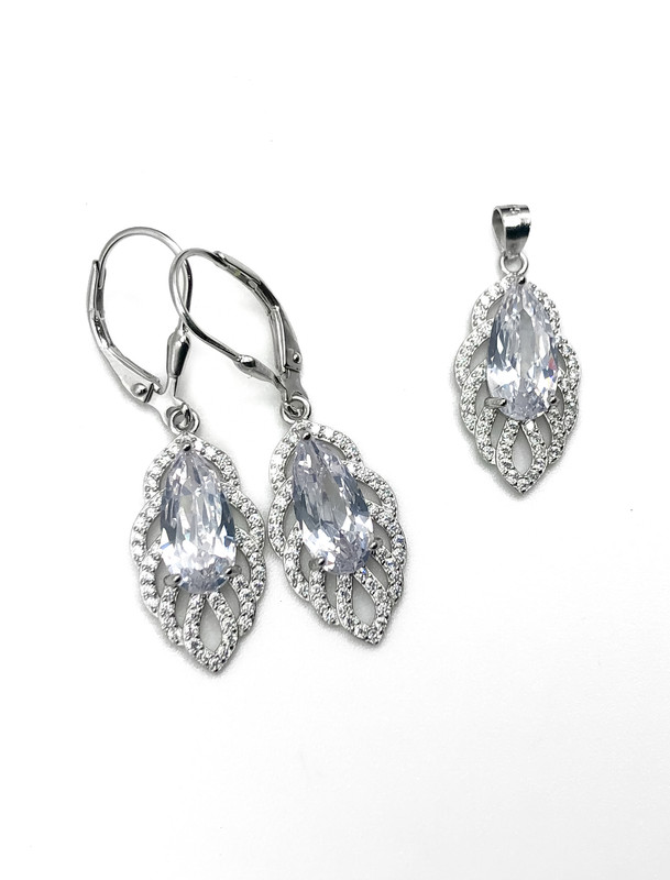 Juegos plata gota espejo piedra blanca central con aza