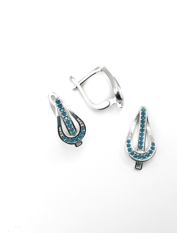 Juegos plata tipo hebilla circon turquesa patente